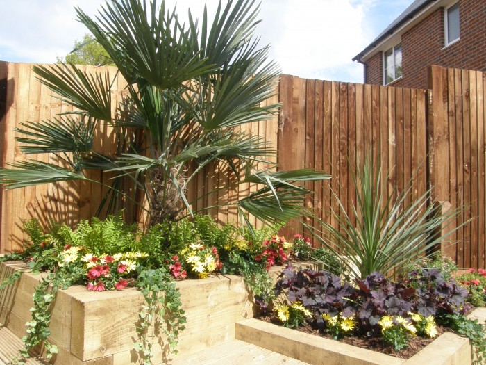 Landscaping project including new brickwork, patio, fencing and decking for a house in Surrey.
